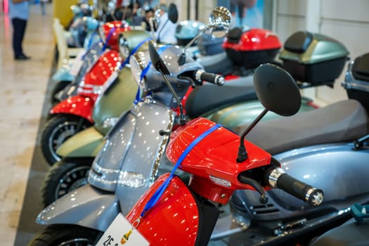 Lisbon, Portugal - May 12, 2023: Jiangsu Goldenlion electric scooters close up on display at ECAR SHOW - Hybrid and Electric Motor Show