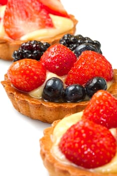Fresh fruit tart on white background