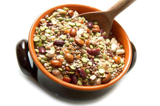 vegetables in crock pot on white background