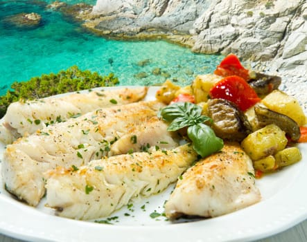 Tasty healthy fish fillet with vegetables