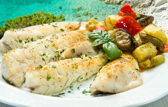 Tasty healthy fish fillet with vegetables