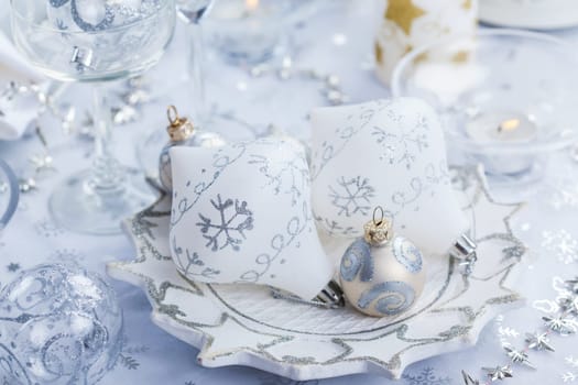 Christmas decoration in silver and white for festive table
