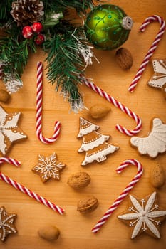 Christmas background with gingerbread cookies and candy cane