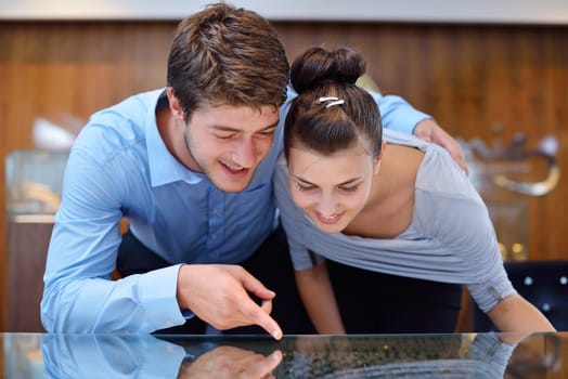 happy young romantic couple in love buy jewelry ring in luxury store