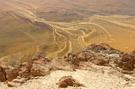 Detail of polluted riverbed of Mosteirao, downstream abandoned pyrite mine of S. Domingos , Mertola, Portugal