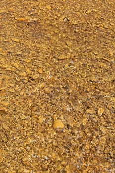Detail of polluted riverbed of Mosteirao, downstream abandoned pyrite mine of S. Domingos , Mertola, Portugal