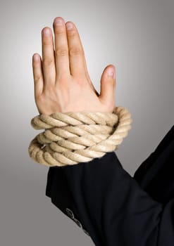 business hands in chain, bond with rope