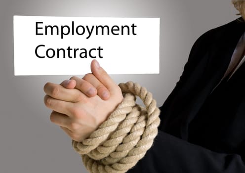 hands in chain holding banner with employment contract