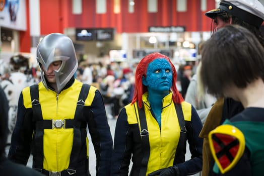 LONDON, UK - OCTOBER 27: Cosplayers impersonating the X-men pose for photographers at the London Comicon MCM Expo. Most participants dress up in superhero costumes to compete in the Euro Cosplay Championship. October 27, 2012 in London.