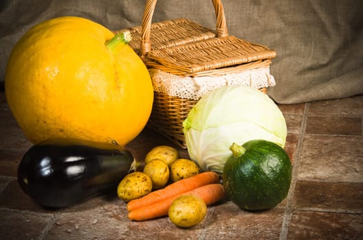 still life with vegetables and a basket
