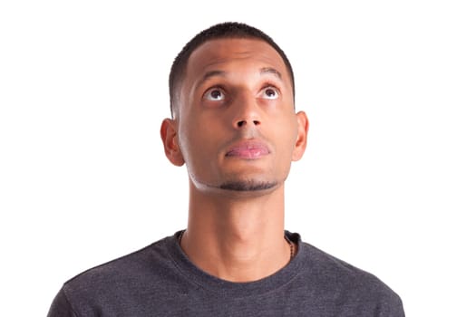 Close up portrait of a young african american man looking up, isolated on white background