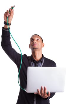 Young african american computer scientist plugin a ethernet cable, isolated on white background