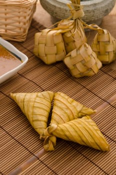Ketupat: South East Asian rice cakes bundle, often prepared for festivities and celebratory occasions.