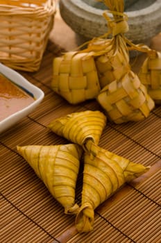 Ketupat: South East Asian rice cakes bundle, often prepared for festivities and celebratory occasions.