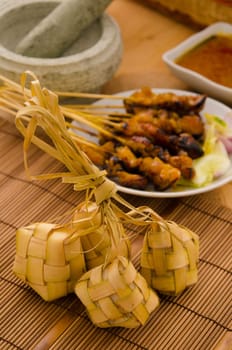 Ketupat: South East Asian rice cakes bundle, often prepared for festivities and celebratory occasions.