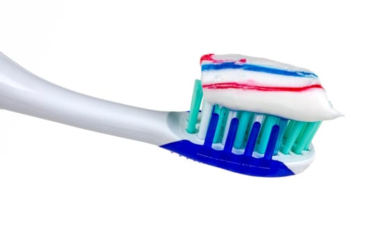 Tooth brush with tooth paste on white background