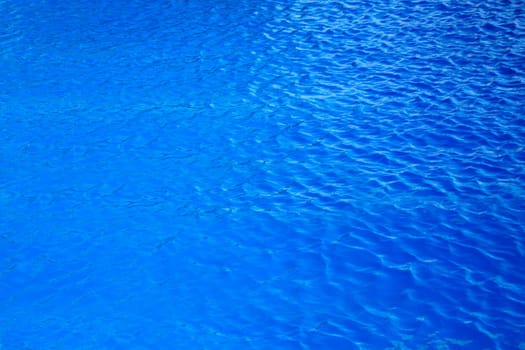 blue,slightly wavy water as a background motif