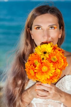 Beautiful bride with wedding bouquet
