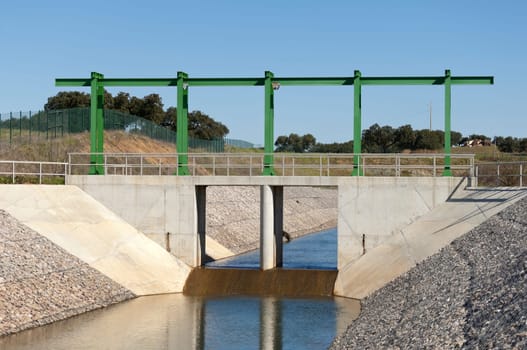 Almost finished sluice gate in the water diversion canal upstream the Alvito reservoir near Oriola village, part of the Alqueva Irrigation Plan, Alentejo, Portugal