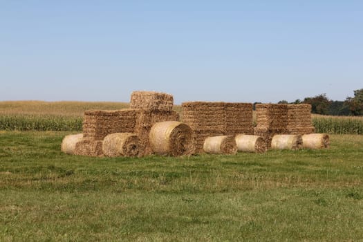 a tractor made of straw bales in a field