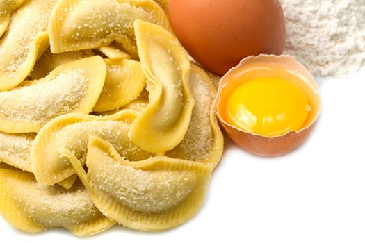 isolated ravioli with ingredients on white background