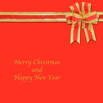 christmas gift with decorative red and gold ribbon bow