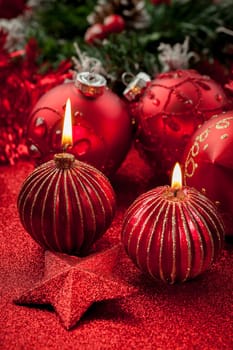 Glittering Christmas candles and balls in red
