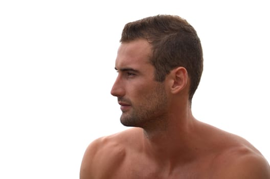 Side view of good looking young man on white background