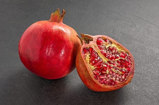 Pomegranate on a slate plate