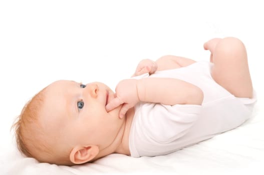 Cute Baby Girl Lying on Back on White Background