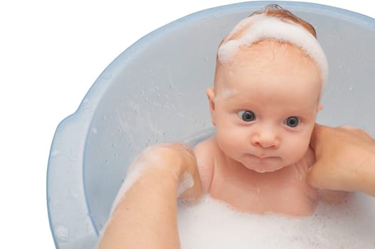Mother Holding Little Baby Girl in Bath