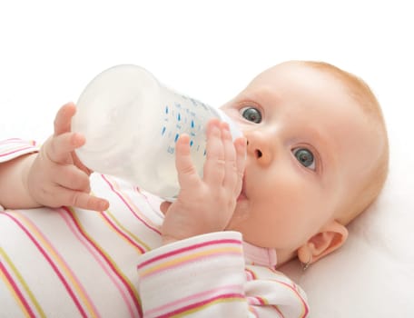 Closeup of Baby Girl Drinking Milk from Bottle