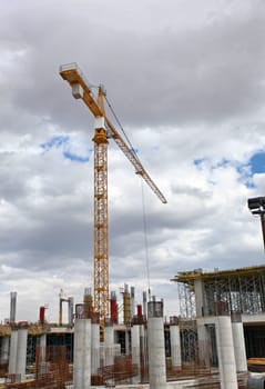Construction workers working on scaffolding