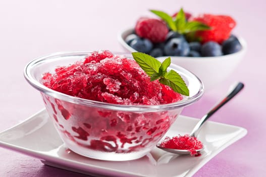 Fresh strawberry granita in glass close up