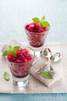 Fresh strawberry granita in glass close up