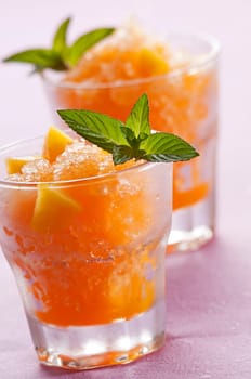 Fresh apricot granita in glass close up