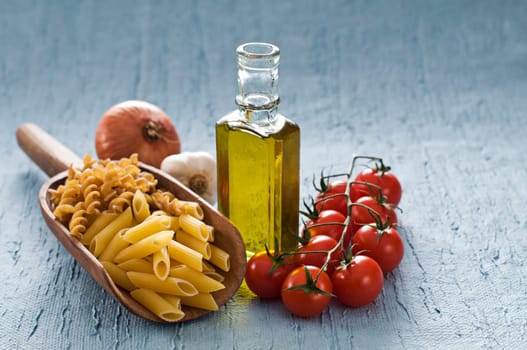 Cooking ingredients on blue background close up