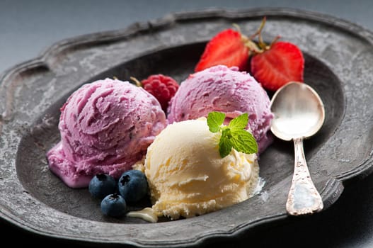 Fresh ice cream on vintage plate close up shoot
