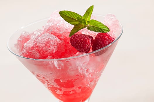 Raspberry granita in glass close up shoot