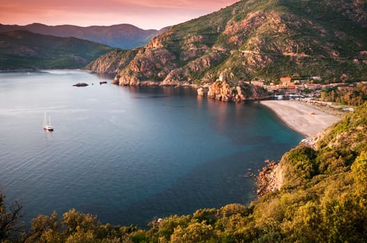 Beautiful sunset over Porto city, Corsica - France