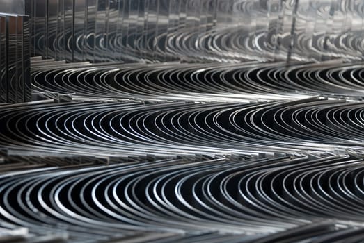 pieces of steel shaped with wave pattern