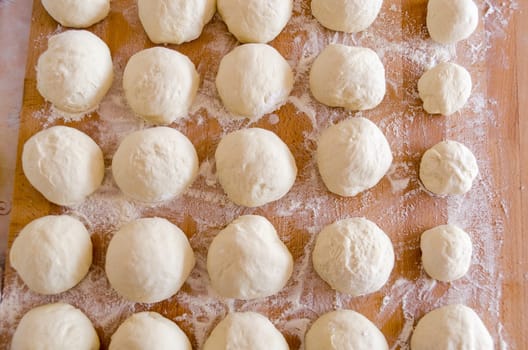 pizza dough risen and ready for cooking