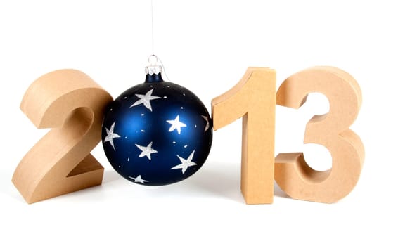 Paper numbers an a christmas ball forming 2013 as for the new year