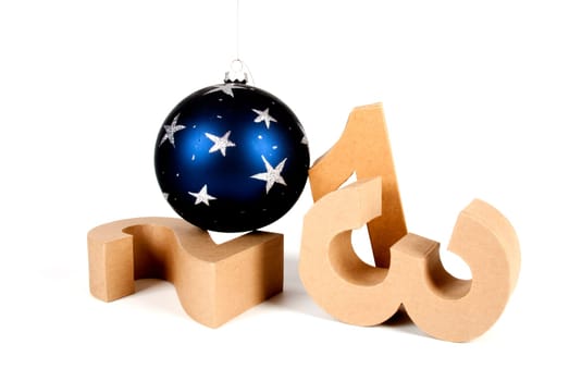 Paper numbers an a christmas ball forming 2013 as for the new year