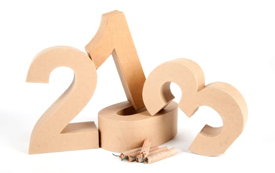 Paper numbers an a christmas ball forming 2013 as for the new year