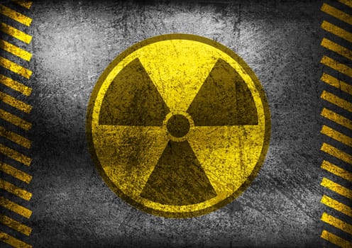 Nuclear radiation symbol on grunge wall. Vector background