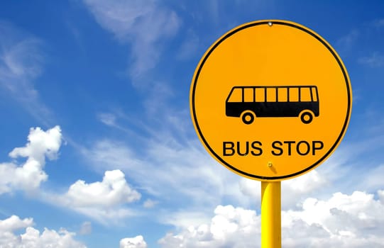 bus stop sign and blue sky