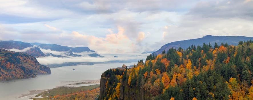 Historic Vista House on Crown Point in Columbia River Gorge one Foggy Day in Fall Season Panorama