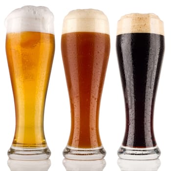 Various wheat beers on white background
