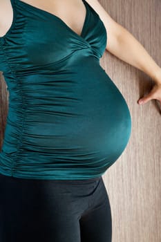 Pregnant woman belly before soon coming child birth
